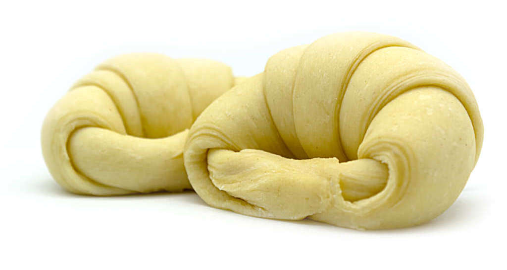 Medialunas congeladas de manteca vista crudas